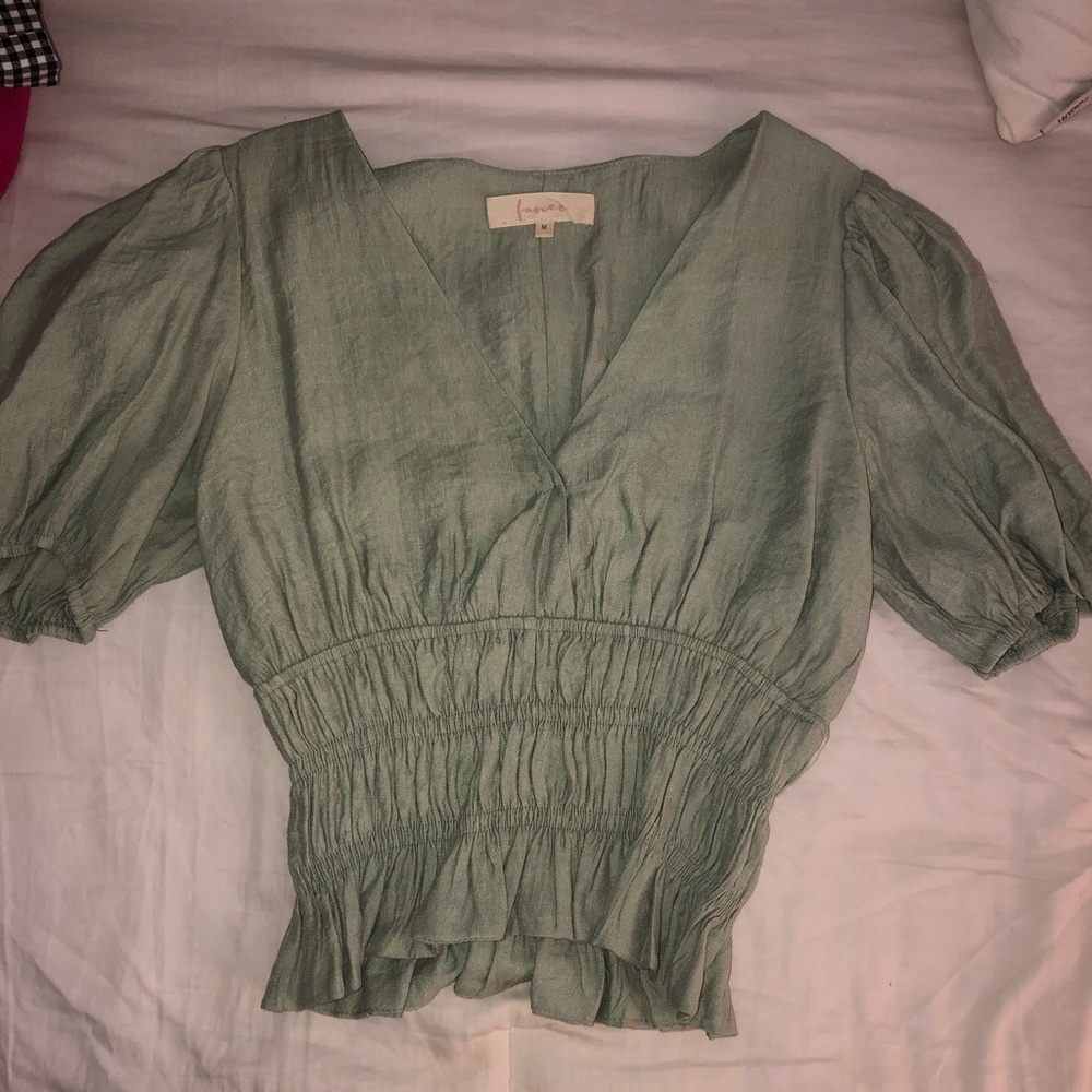 Green v neck going out top